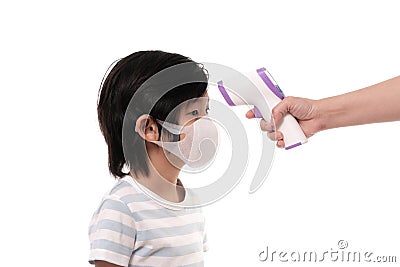 Child with protection mask with infared thermometer Stock Photo