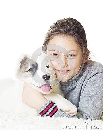 Child and puppy Shepherd Stock Photo