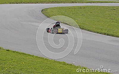 Child Racing Go Kart Stock Photo