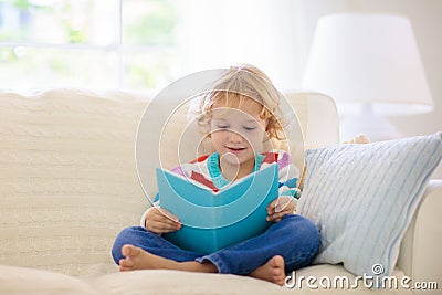 Child reading book. Kids read books Stock Photo