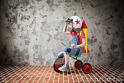 Child riding a retro bicycle Stock Photo