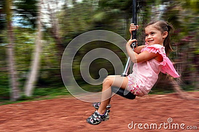 Child rids on Flying Fox Stock Photo