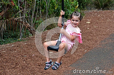 Child rids on Flying Fox Stock Photo