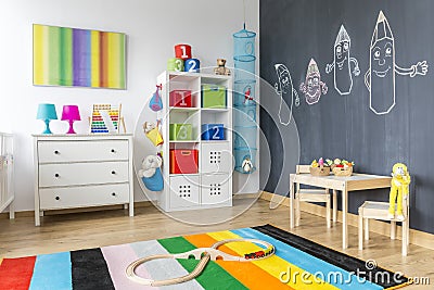 Child room with colorful rug Stock Photo