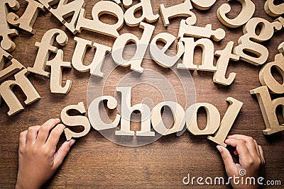 Child`s Hand Arrange School Word Stock Photo