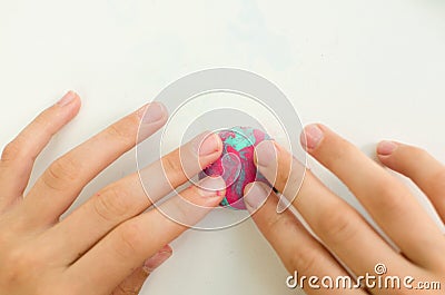 Child`s hands with colored plasticine. Stock Photo