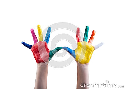 Child's hands painted with multicolored finger paints Stock Photo