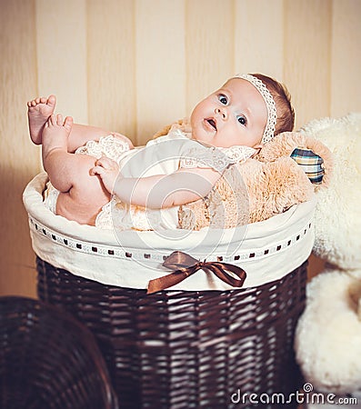 Child's portrait in a basket Stock Photo