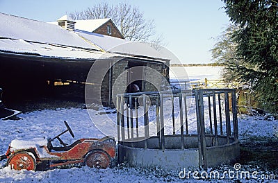 Farmyard in UK. Winter snow on fields and barns Editorial Stock Photo