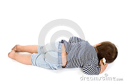 Child in sailor's striped vest lying down Stock Photo