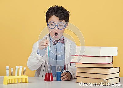 Child scientist in laboratory Stock Photo