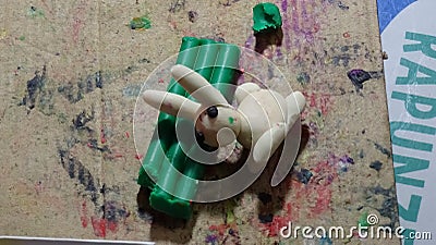 The chÐ´ild sculpts from plasticine. Rabbit, snail, duck, carrot. Stock Photo