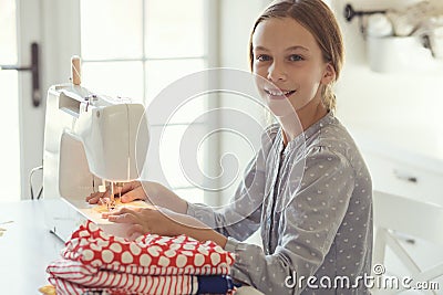 Child sewing Stock Photo