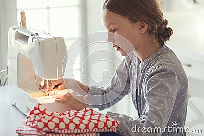 Child sewing Stock Photo