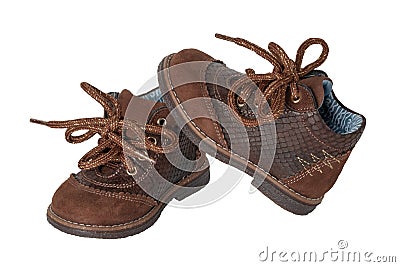 Child shoe fashion. A pair of elegant brown leather shoes with s Stock Photo