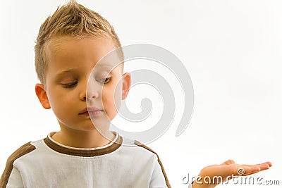 Child showing something on hand Stock Photo