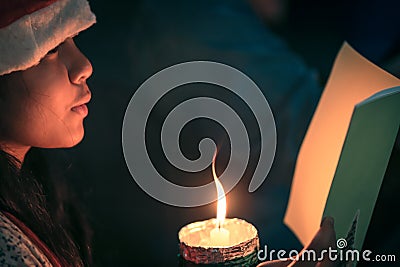 Child singing carol song Stock Photo