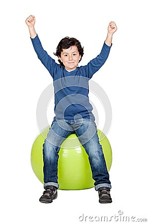 Child sitting on a pilates ball Stock Photo