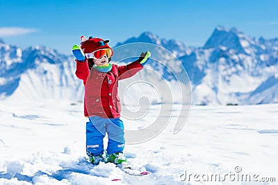 Kids winter snow sport. Children ski. Family skiing. Stock Photo