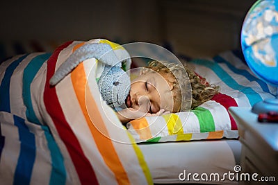 Child sleeping at night. Kids sleep Stock Photo