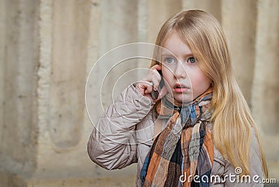 The child speaking on the phone Stock Photo