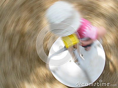 Child spinning Stock Photo