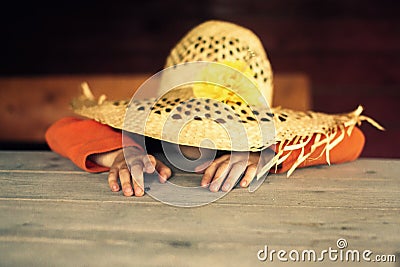 Child in a straw hat Stock Photo