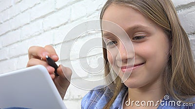 Child Studying on Tablet, Girl Writing for School Class, Learning Doing Homework Stock Photo