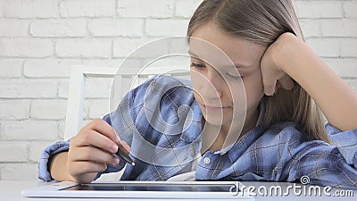 Child Studying on Tablet, Girl Writing in School Class, Learning Doing Homework Stock Photo