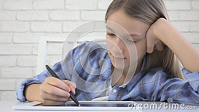 Child Studying on Tablet, Girl Writing in School Class, Learning Doing Homework Stock Photo