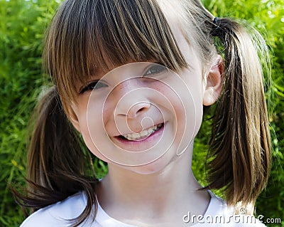 Child with sweet happy smile Stock Photo