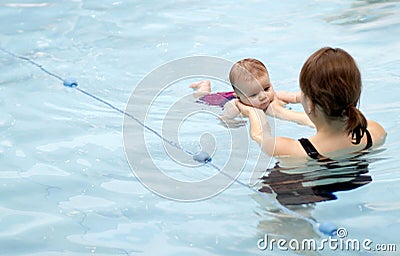 Child swimming lessons Stock Photo