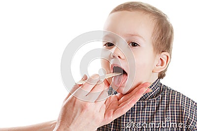 Child syrup spoon medicine baby, flu dose Stock Photo