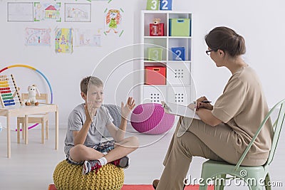 Child talking to therapist Stock Photo