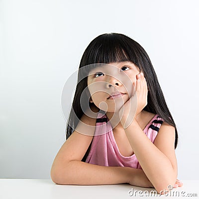 Child thinking Stock Photo