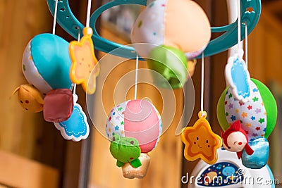 Child toy musical mobile air balloons with animals peeking out Stock Photo