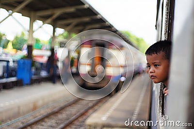 Child in trian Editorial Stock Photo