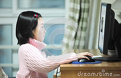 Child use computer Stock Photo