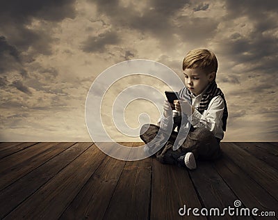 Child Using Mobile Phone, Little Kid Boy Playing Telephone Stock Photo