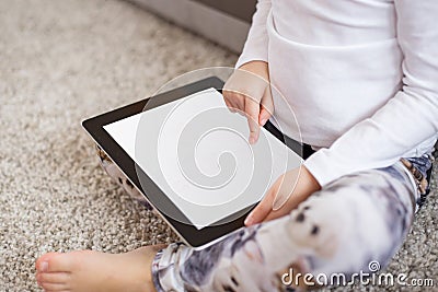 Child using tablet computer Stock Photo