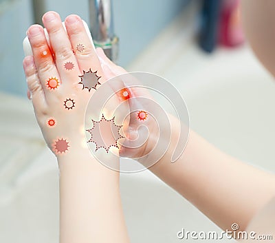 A child washes his hands with soap in the bathroom. The concept of hygiene and clean hands, infection, close-up, soundness Stock Photo