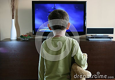 Child watching TV Stock Photo