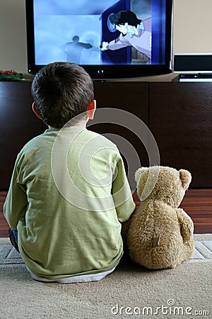 Child watching TV Stock Photo