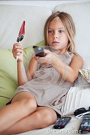 Child watching tv Stock Photo