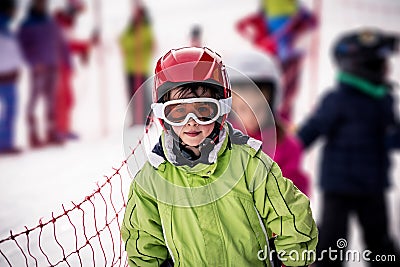 Child who is going to take the ski lift Stock Photo