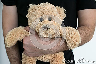 Childe abuse bear closeup help save protect help emotion Stock Photo