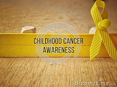 Childhood cancer awareness text background. Health care concept. Stock Photo