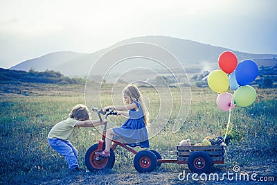 Childhood concept. American farm life. Springtime on the ranch. Two young farmers. Childhood on countryside. Active Stock Photo