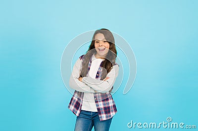 Childhood happiness. Following her personal style. stylish teen girl turquoise background. pretty teen girl with long Stock Photo