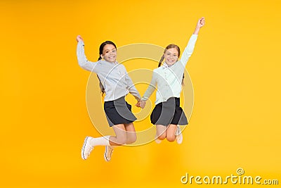 Childhood happiness. School day fun cheerful moments. Kids cute students. Schoolgirls best friends excellent pupils Stock Photo